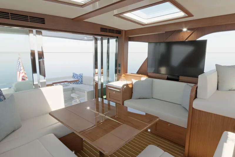 Slide: The Image of Luxurious interior of 2026 Sabre 51 Salon Express yacht with modern seating and large TV. - 4