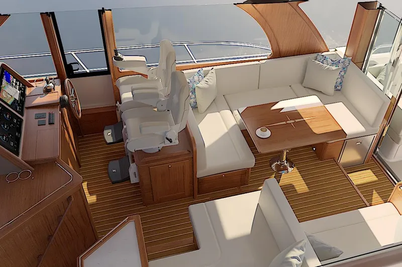 Slide: The Image of Luxurious interior of 2026 Sabre 51 Salon Express yacht with plush seating and modern helm. - 9