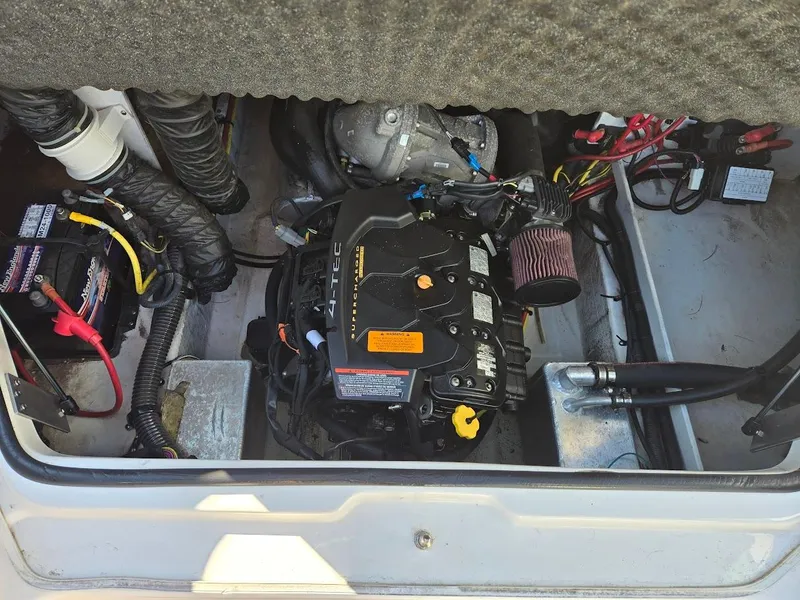 Slide: The Image of Engine compartment of a 2015 Chaparral 203V boat. - 8