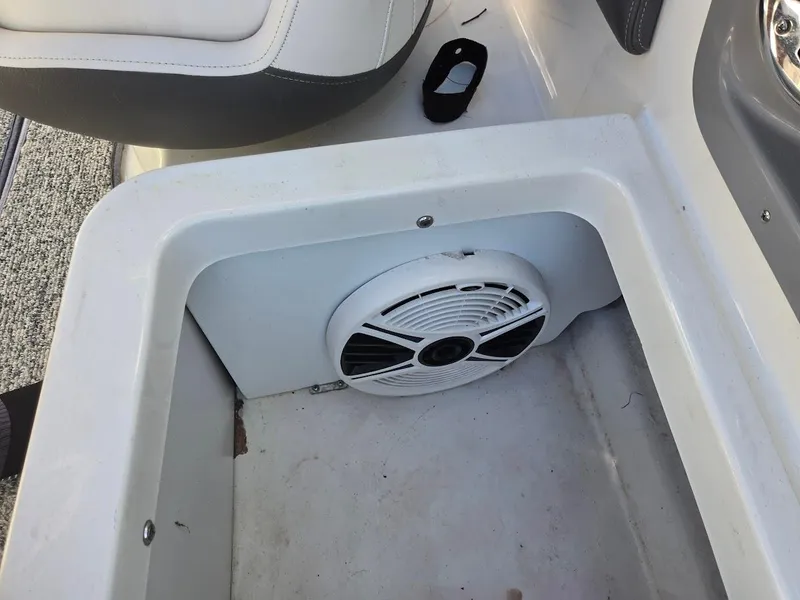Slide: The Image of 2015 Chaparral 203V boat interior with built-in speaker. - 9