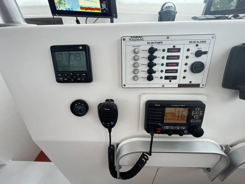 Slide: The Image of Interior of 2016 Wesmac 42 boat with modern navigation equipment and comfortable seating. - 34
