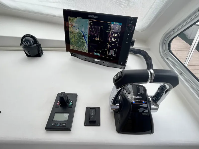 Slide: The Image of Wesmac 42 boat navigation system with Simrad display and Ritchie compass, 2016 model. - 38