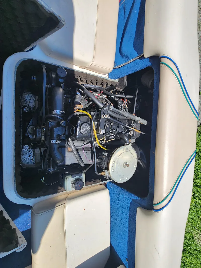 Slide: The Image of 1997 Sea Ray 175 Five Series boat engine compartment with visible components. - 23