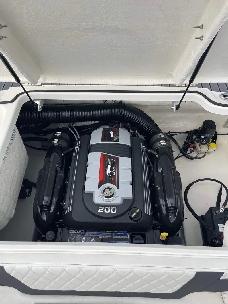 Slide: The Image of 2023 Bayliner VR4 boat engine compartment with 200 HP engine. - 1