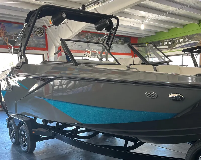 Slide: The Image of 2023 Heyday H22 boat on display in a showroom. - 2