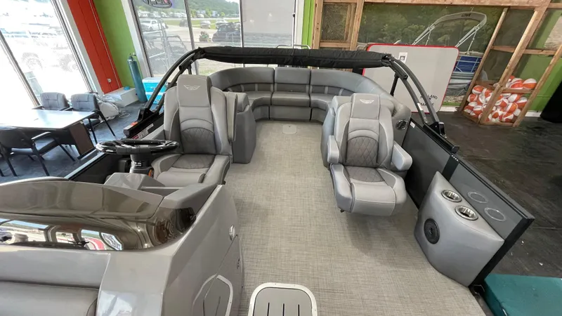 Slide: The Image of 2024 Bennington 23LFB pontoon boat interior with luxurious seating and modern design. - 4