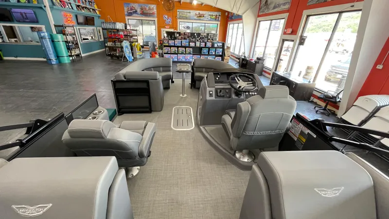 Slide: The Image of Interior of a 2024 Bennington 23LFB pontoon boat in a showroom. - 5