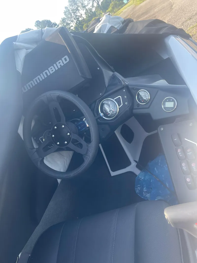 Slide: The Image of Cockpit of 2025 Skeeter ZXR 20 boat with Humminbird electronics. - 6