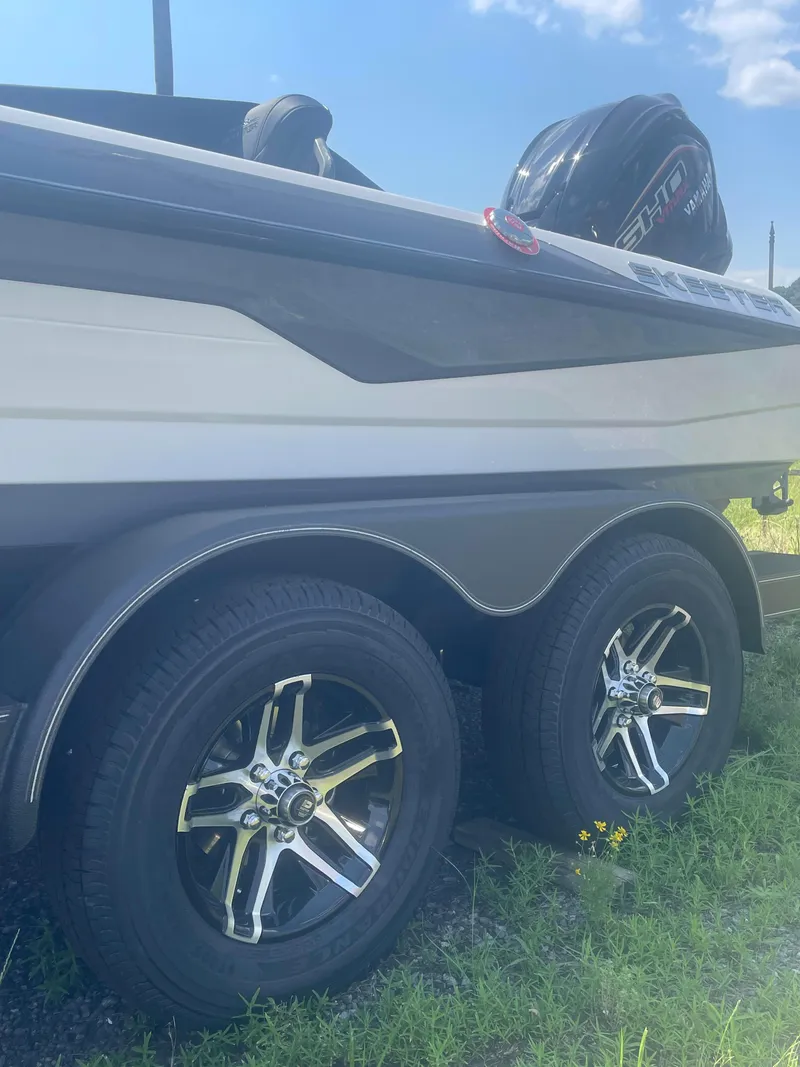 Slide: The Image of 2025 Skeeter ZXR 20 boat trailer with dual wheels. - 9
