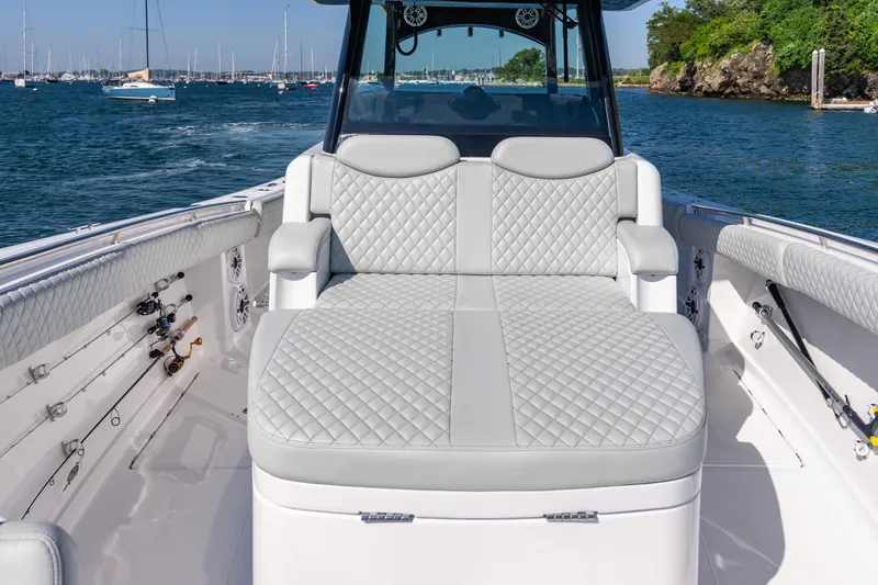 Slide: The Image of 2024 HCB 39 Speciale boat with luxurious seating on a sunny day. - 15