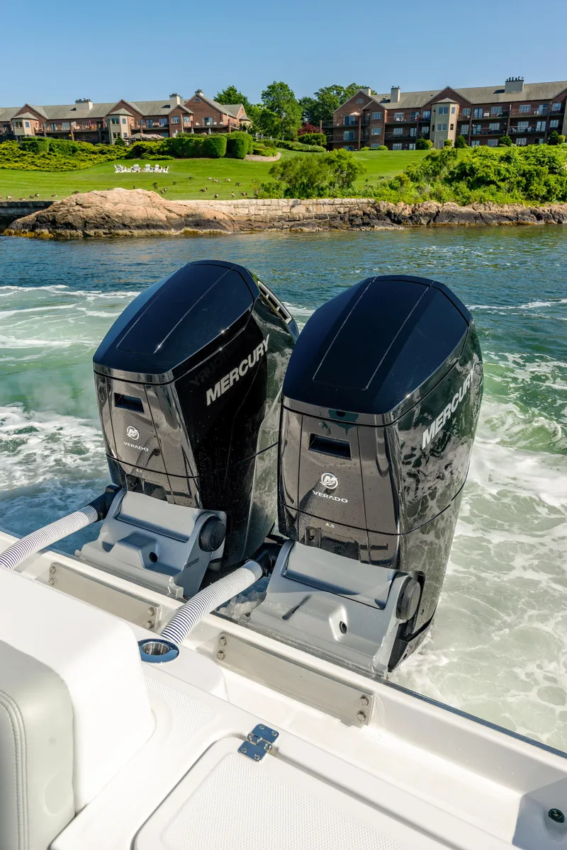Slide: The Image of 2024 HCB 39 Speciale with twin Mercury outboard engines on the water. - 23