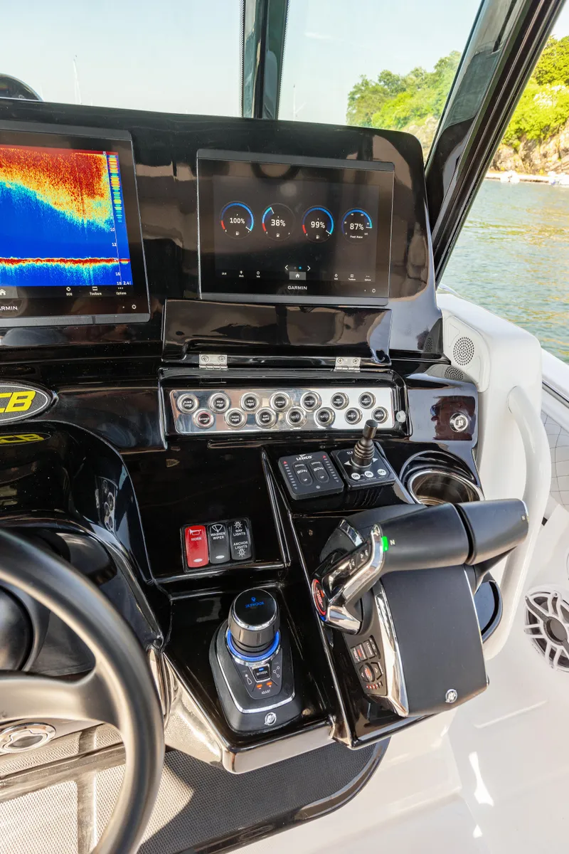 Slide: The Image of Control panel of the 2024 HCB 39 Speciale boat with advanced navigation systems. - 31