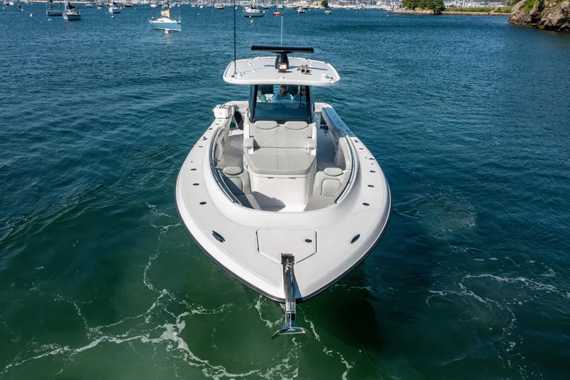 Slide: The Image of 2024 HCB 39 Speciale boat on water, front view. - 7