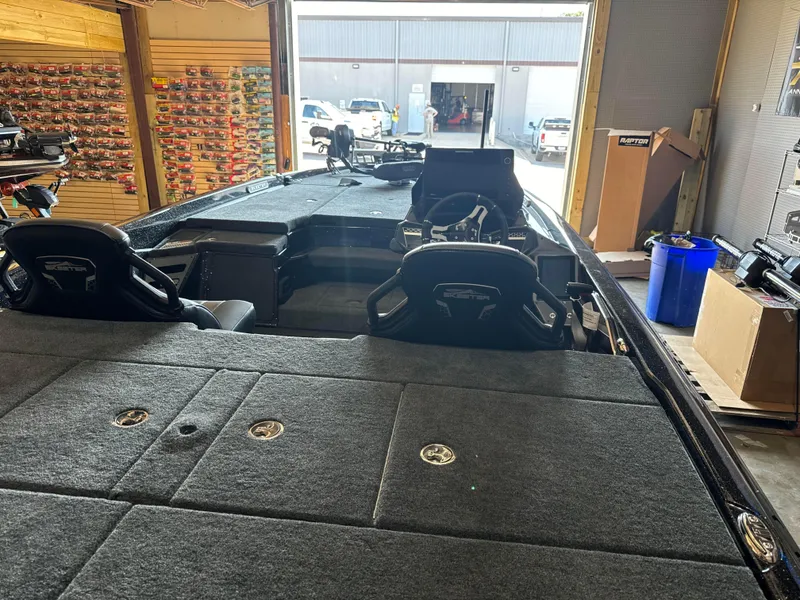 Slide: The Image of 2025 Skeeter FXRL21 fishing boat interior in a garage. - 3