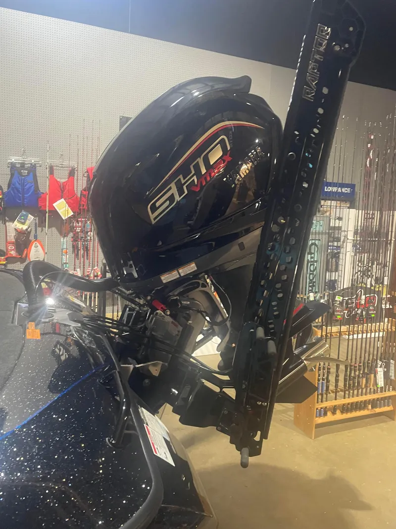 Slide: The Image of 2025 Skeeter FXRL21 boat with SHO motor in a showroom. - 4