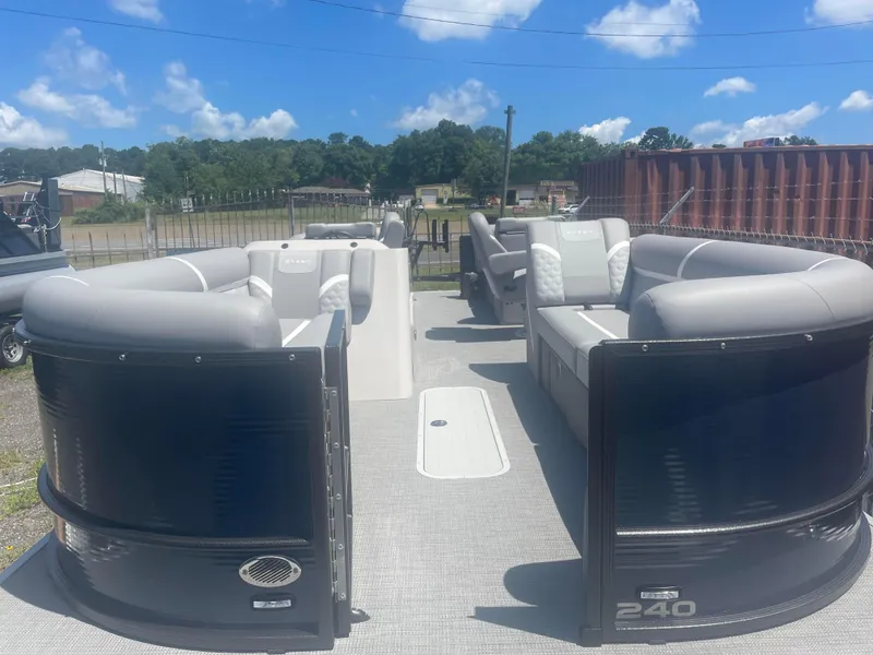 Slide: The Image of 2024 Crest Classic DLX 240 CPT pontoon boat with spacious seating. - 3