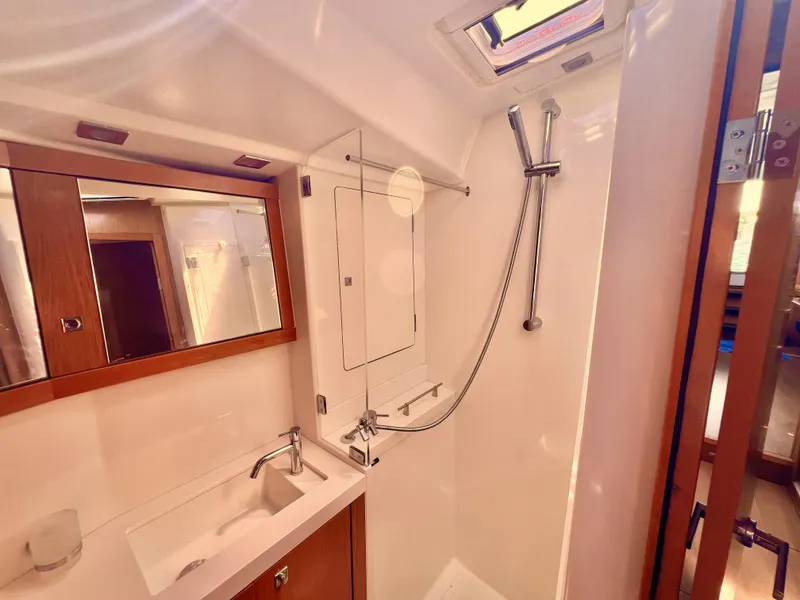 Slide: The Image of Modern bathroom in 2012 Beneteau Sense 50 yacht with shower and sink. - 10