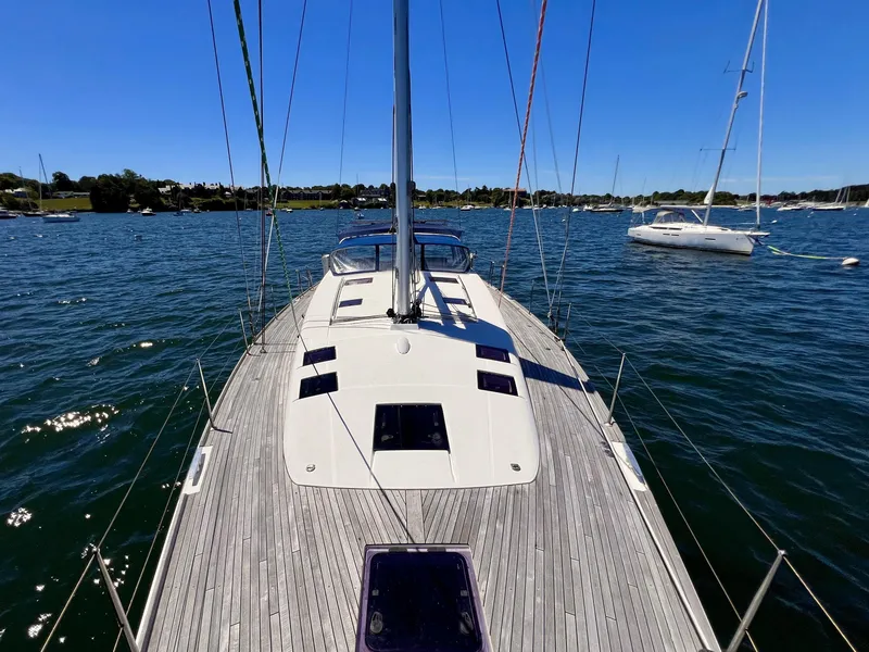 Slide: The Image of 2012 Beneteau Sense 50 sailboat on calm waters, view from deck. - 19