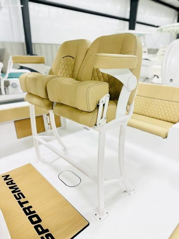 Slide: The Image of 2024 Sportsman MASTERS 247 BAY boat with tan cushioned seating. - 3