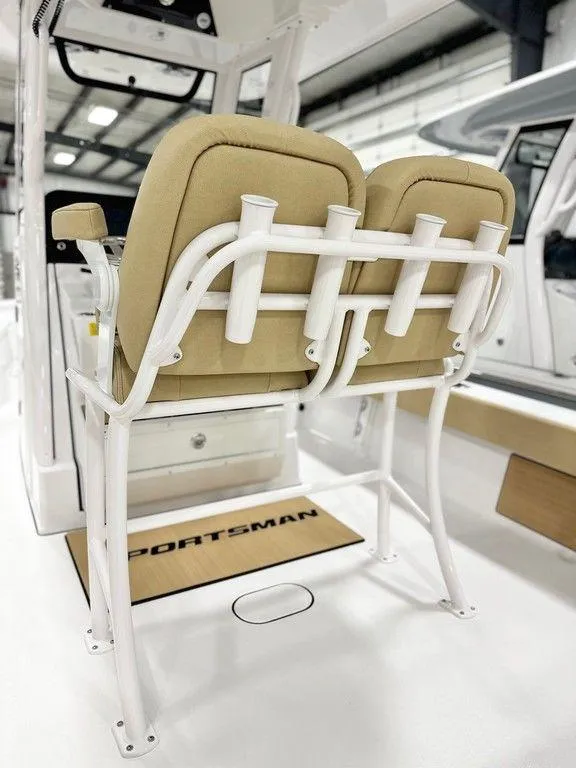 Slide: The Image of 2024 Sportsman MASTERS 247 BAY boat with beige seats and rod holders. - 5