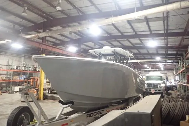 Slide: The Image of 2022 SeaHunter 35 Tournament boat on trailer in warehouse. - 1