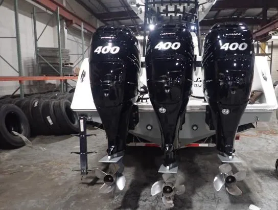 Slide: The Image of 2022 SeaHunter 35 Tournament with triple 400 horsepower engines in a warehouse. - 3