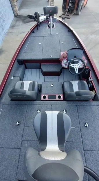Slide: The Image of 2021 Vexus AVX1880 fishing boat interior with seating and steering console. - 4