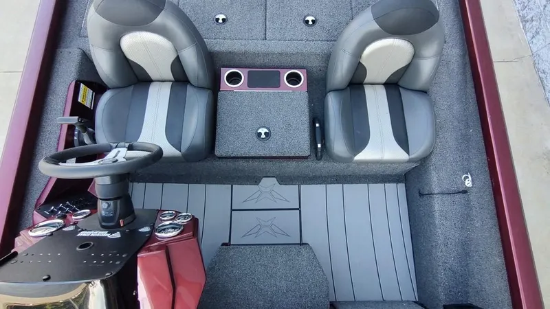 Slide: The Image of 2021 Vexus AVX1880 boat interior with dual seats and steering console. - 5