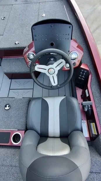 Slide: The Image of 2021 Vexus AVX1880 boat cockpit with steering wheel and seat. - 6