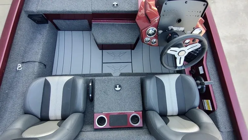 Slide: The Image of 2021 Vexus AVX1880 boat interior with steering wheel and seating. - 7