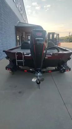 Slide: The Image of 2021 Vexus AVX1880 boat, rear view, parked on concrete. - 9