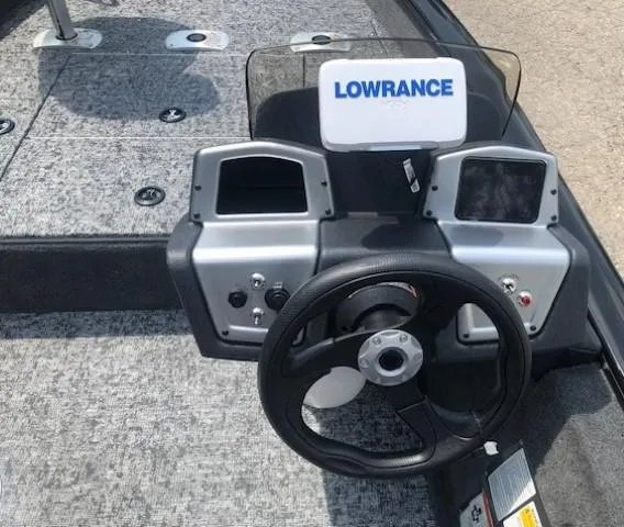 Slide: The Image of 2025 Tracker Pro Team 175 Crappie Edition boat dashboard with Lowrance fish finder. - 16