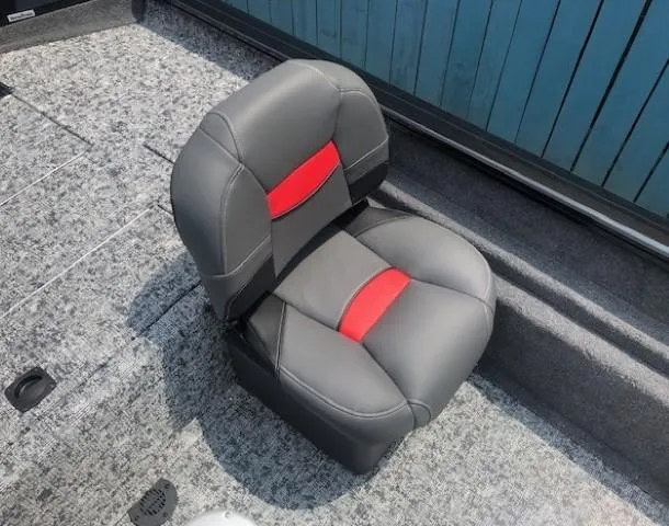 Slide: The Image of 2025 Tracker Pro Team 175 Crappie Edition boat seat with gray and red upholstery. - 18