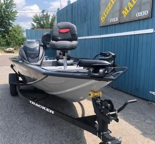 Slide: The Image of 2025 Tracker Pro Team 175 Crappie Edition fishing boat on trailer. - 2