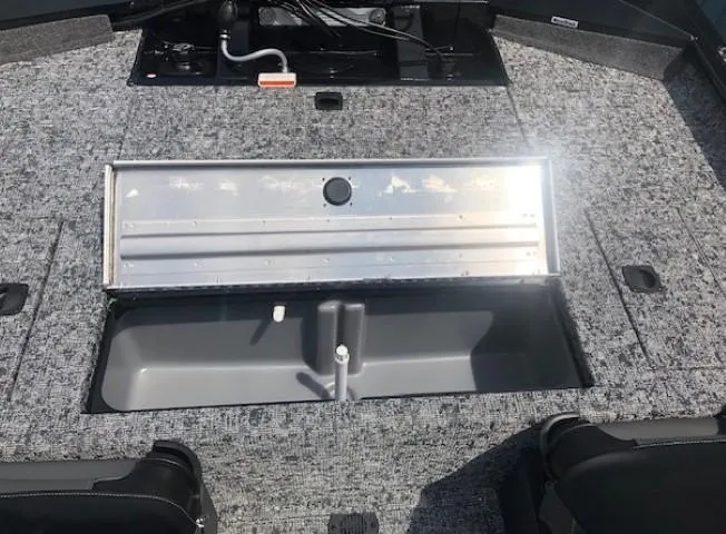 Slide: The Image of 2025 Tracker Pro Team 175 Crappie Edition boat interior with open storage compartment. - 22