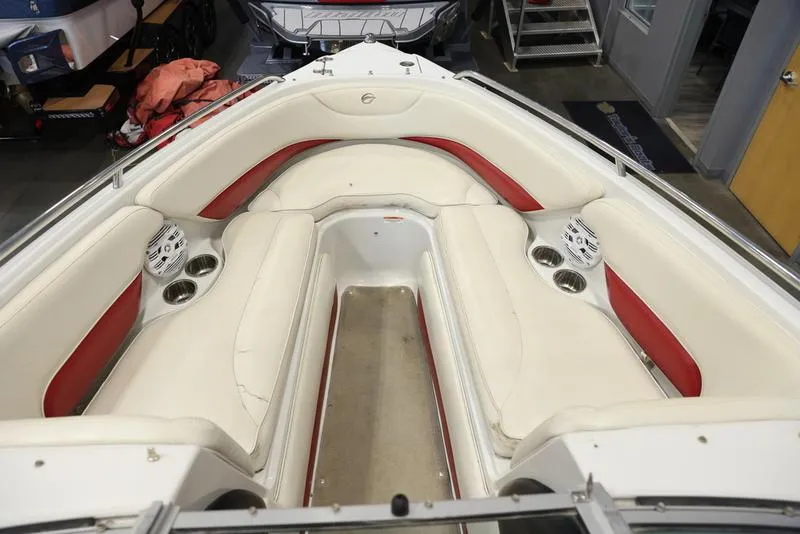Slide: The Image of 2007 Crownline 23 SS boat interior with white and red seating. - 13