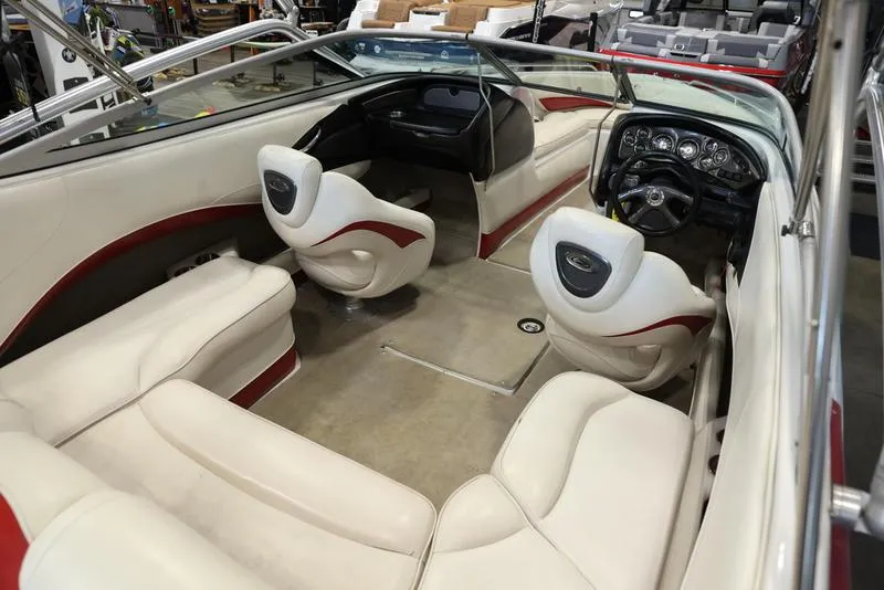 Slide: The Image of 2007 Crownline 23 SS boat interior with white and red seating. - 14