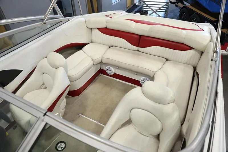 Slide: The Image of 2007 Crownline 23 SS boat interior with white and red seating. - 17