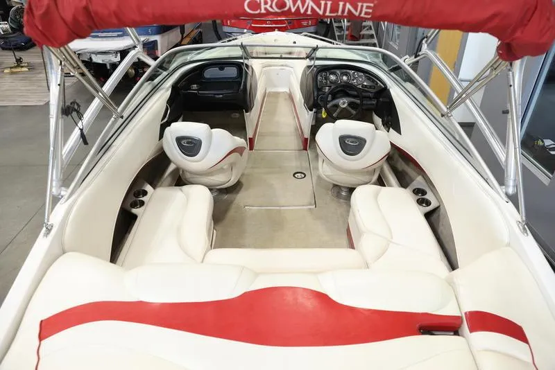Slide: The Image of 2007 Crownline 23 SS boat interior with white and red seating. - 9