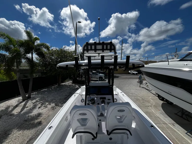 Slide: The Image of 2024 Sportsman Masters 267 Bay Boat under a sunny sky. - 17