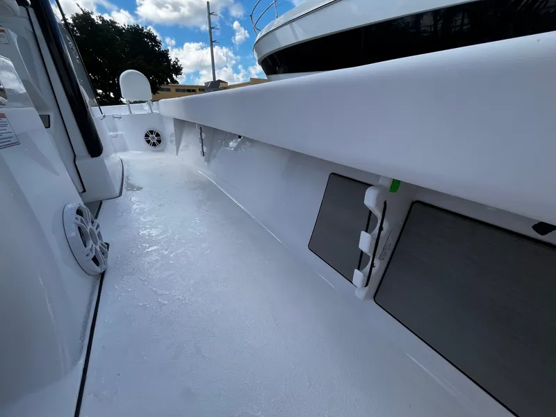 Slide: The Image of 2024 Sportsman Masters 267 Bay Boat interior deck view. - 26