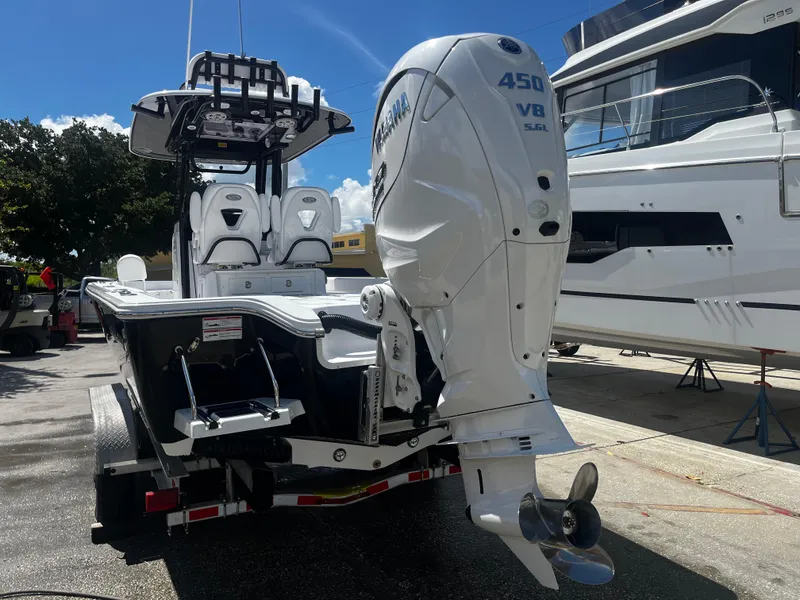 Slide: The Image of 2024 Sportsman Masters 267 Bay Boat with Yamaha 450 V8 engine on trailer. - 4