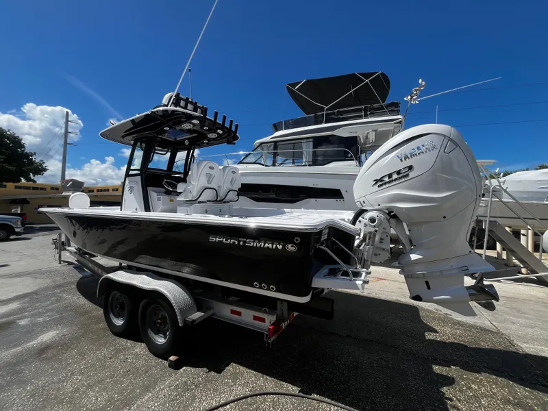 Slide: The Image of 2024 Sportsman Masters 267 Bay Boat with Yamaha engine on trailer. - 5