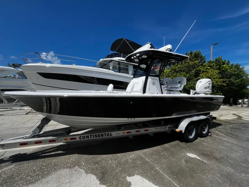 Slide: The Image of 2024 Sportsman Masters 267 Bay Boat on a Continental trailer. - 7