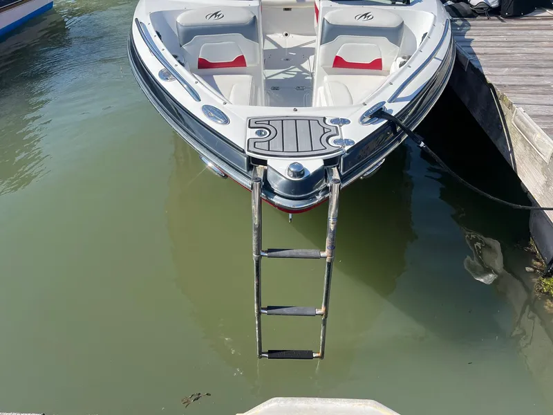 Slide: The Image of 2015 Monterey 204FS boat docked with ladder extended. - 4