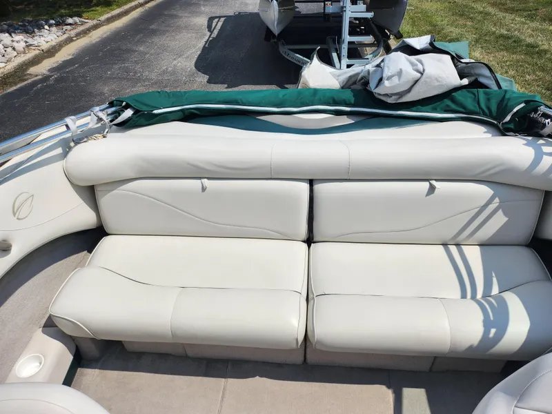 Slide: The Image of 2000 Crownline 192 BR boat interior with white leather seats. - 20