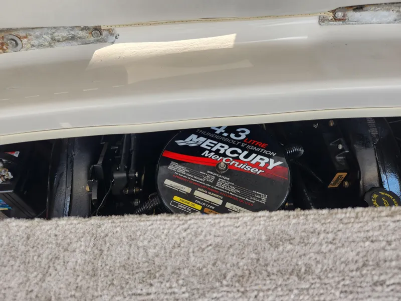 Slide: The Image of Crownline 192 BR 2000 boat engine compartment with Mercury MerCruiser 4.3L engine. - 22