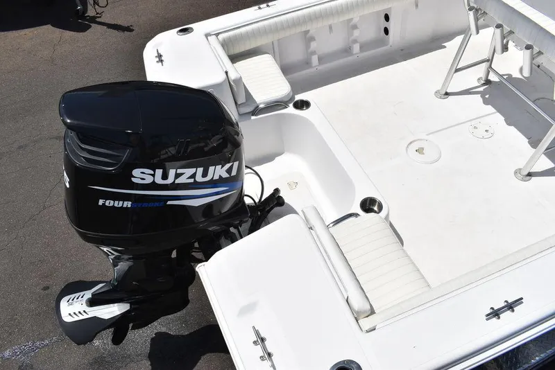Slide: The Image of 2006 Pro-Line 21 Sport Center Console boat with Suzuki outboard motor. - 11