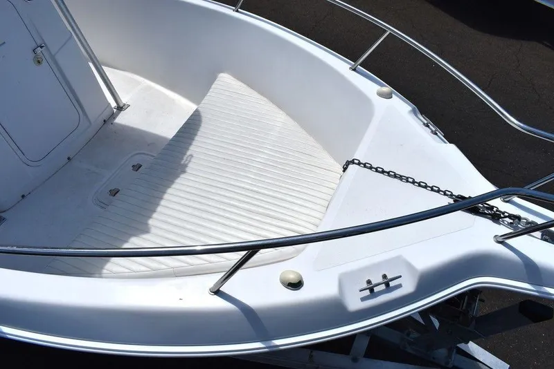 Slide: The Image of 2006 Pro-Line 21 Sport Center Console boat deck with stainless steel railings. - 20