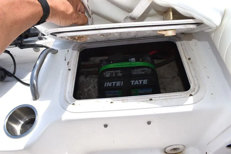 Slide: The Image of 2006 Pro-Line 21 Sport Center Console battery compartment with Interstate battery. - 29